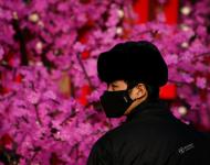 2017年1月3日，北京，一名戴著口罩的安保人員。攝影：Thomas Peter